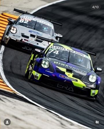 Purple and lime Porsche attacking a corner