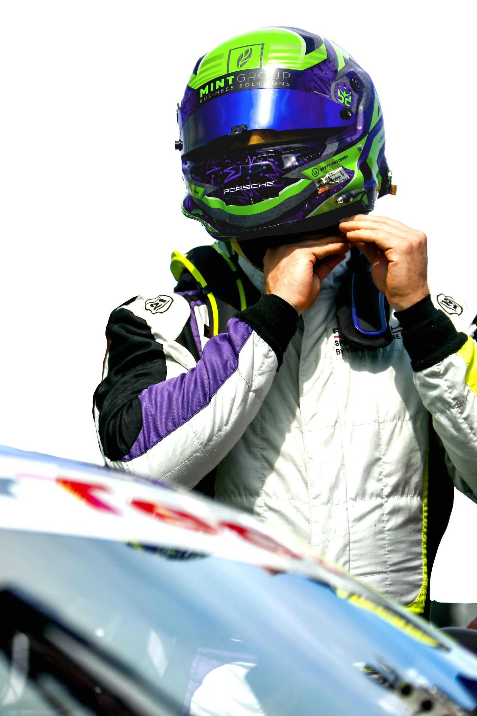 Kenton King putting on his purple and lime racing helmet
