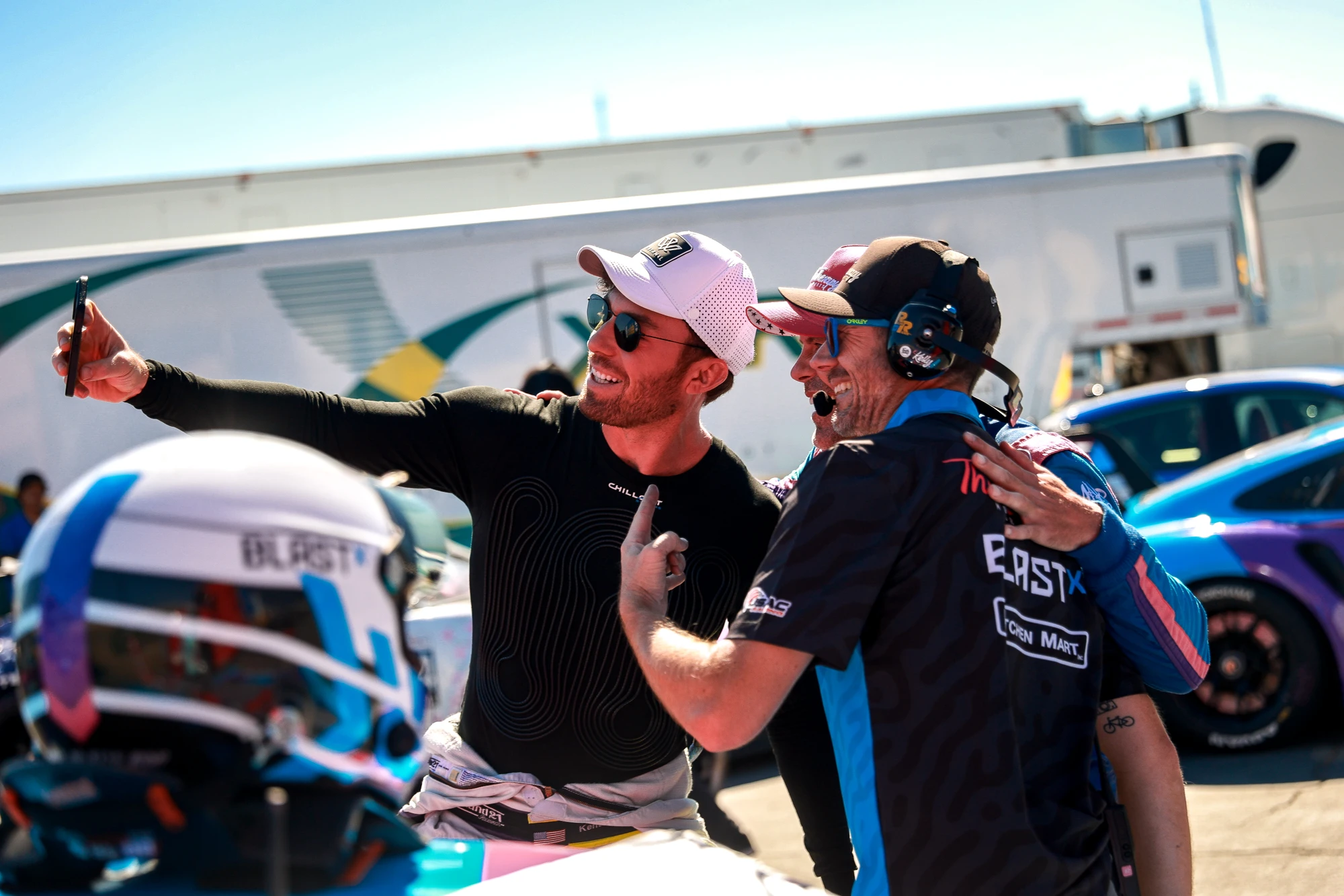 Kenton taking a group selfie with people in the paddock